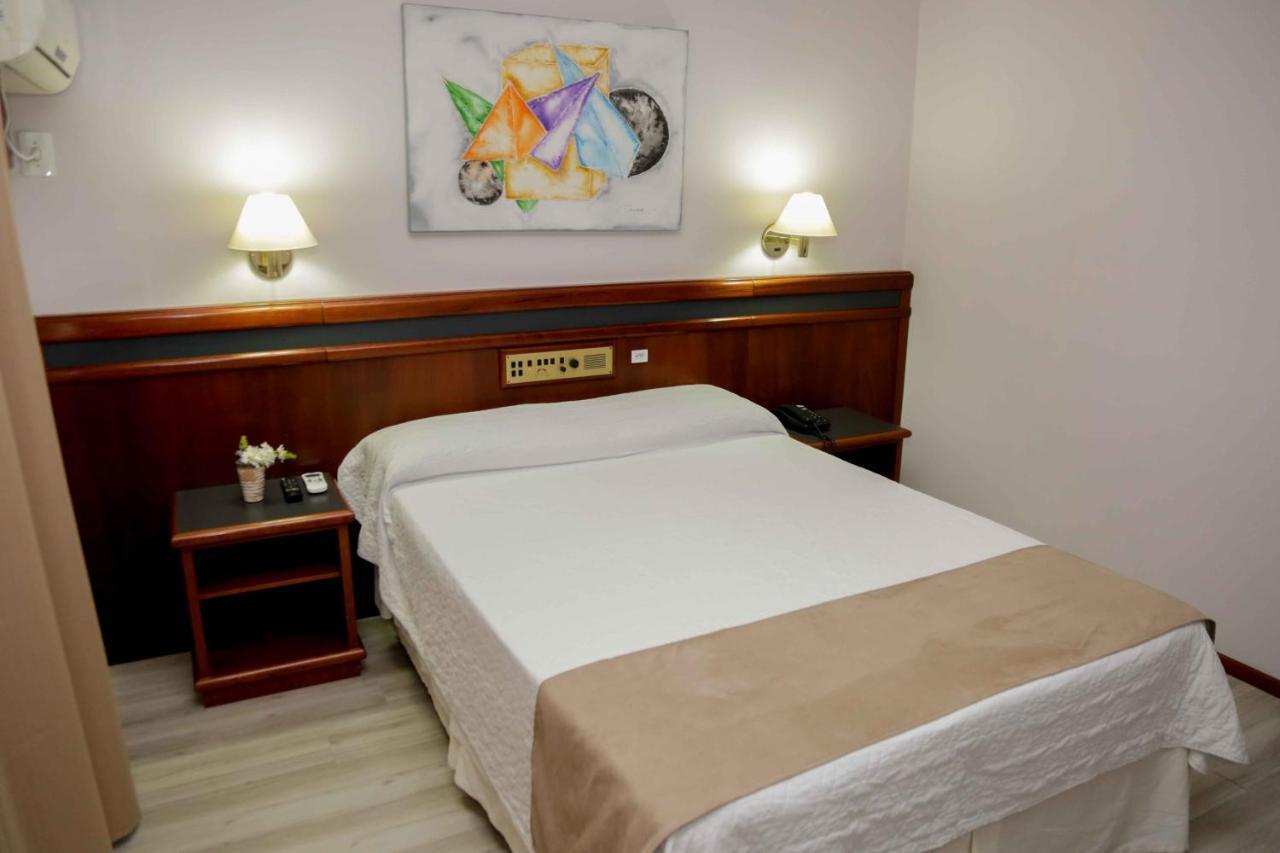 Susin Hotel Mafra Bagian luar foto